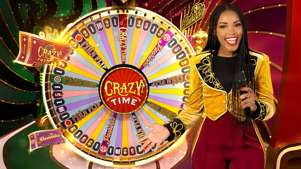 Crazy Time live studio with the host standing beside the full wheel